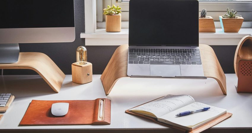 Free A stylish and contemporary home office setup with laptop and desk accessories. Stock Photo