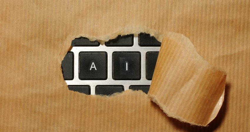 A piece of cardboard with a keyboard appearing through it